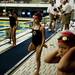 Milan swimmer Kendal Sanders stretches before competing in the 8 & under 50 meter breaststroke on Monday, July 29. She won her heat. Daniel Brenner I AnnArbor.com